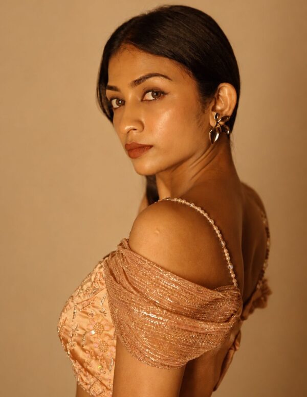 Peach Embellished Corset Blouse with Shimmer Lehenga Skirt